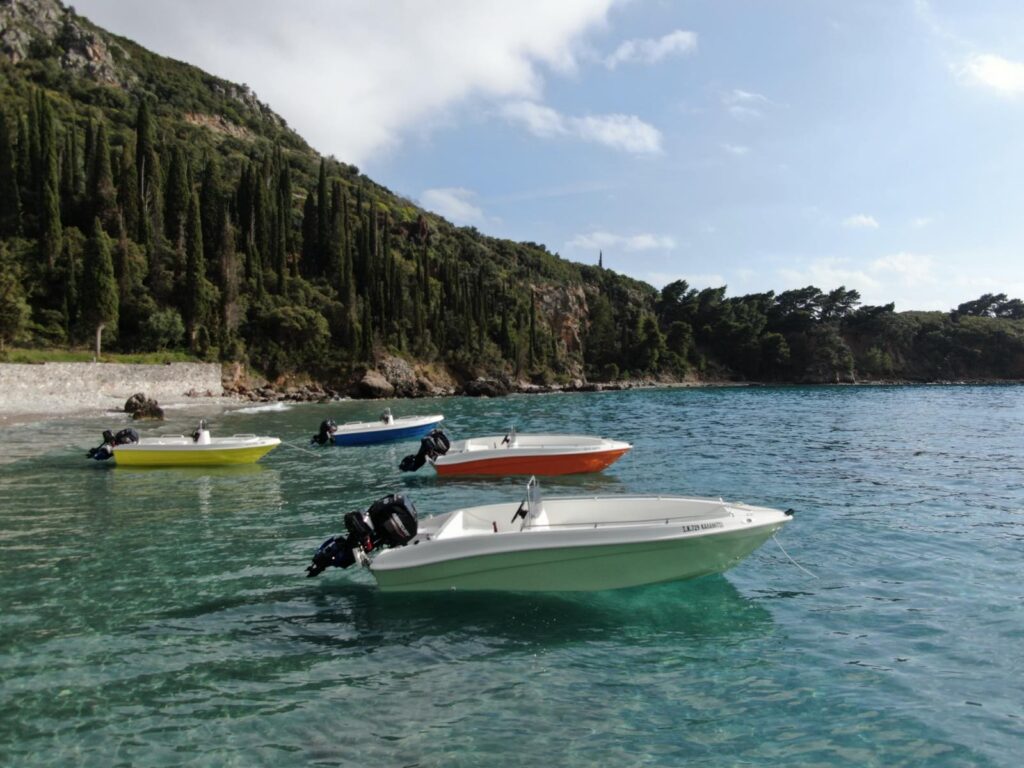 A photograph of four of Kardamili Boat Rentals in Kalamitsi Beach Mani