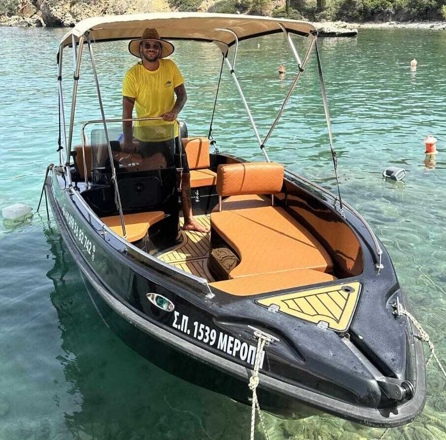 This is our crew member Stavros Kitsigiannis in our Meropi Boat at Kardamili Harbor.