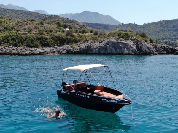 This is an image of our black Kardamili Boat Rentals boat called Meropi, as seen from above.