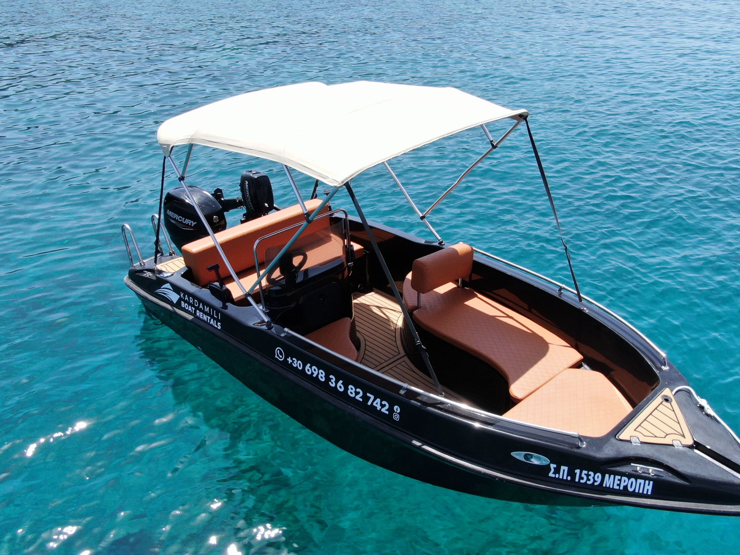 This is an image of our black Kardamili Boat Rentals boat called Meropi, as seen from above.