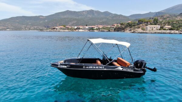 This is an image of our black Kardamili Boat Rentals boat called Meropi, as seen from above.